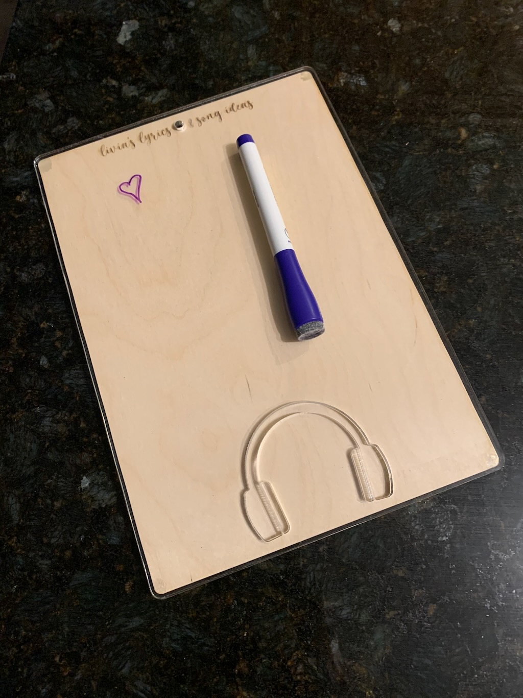 Laser cut and engraved birch wood and acrylic notepad holder with a custom engraved face